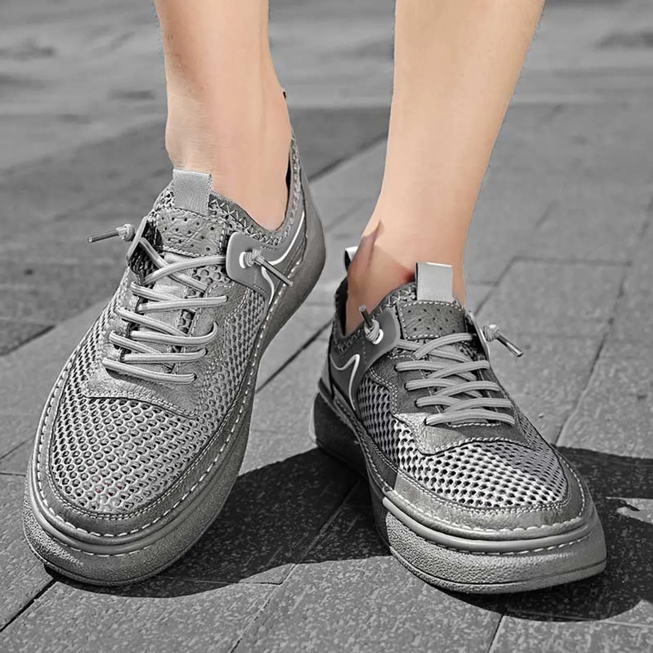 Grey hollow mesh stitch accents shoe sneaker