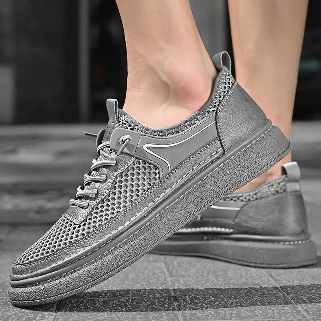 Grey hollow mesh stitch accents shoe sneaker