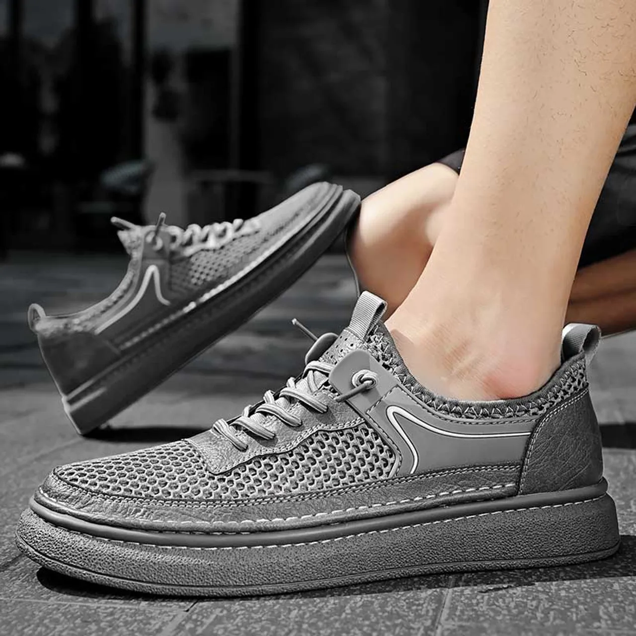 Grey hollow mesh stitch accents shoe sneaker