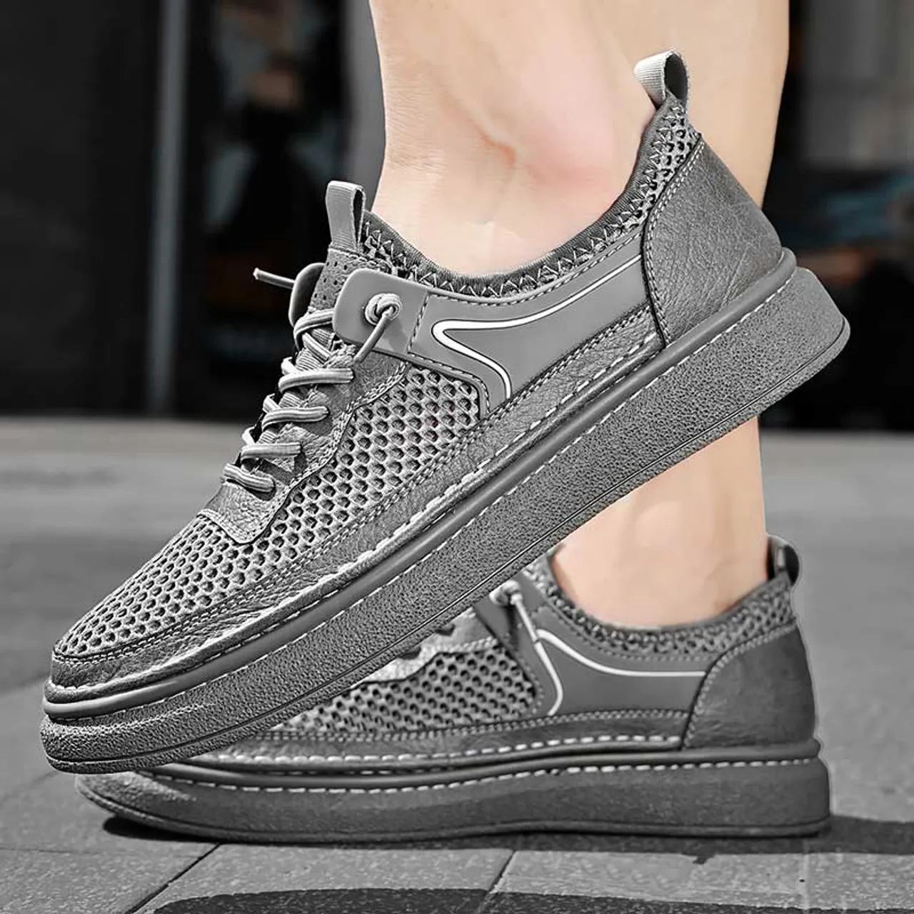 Grey hollow mesh stitch accents shoe sneaker