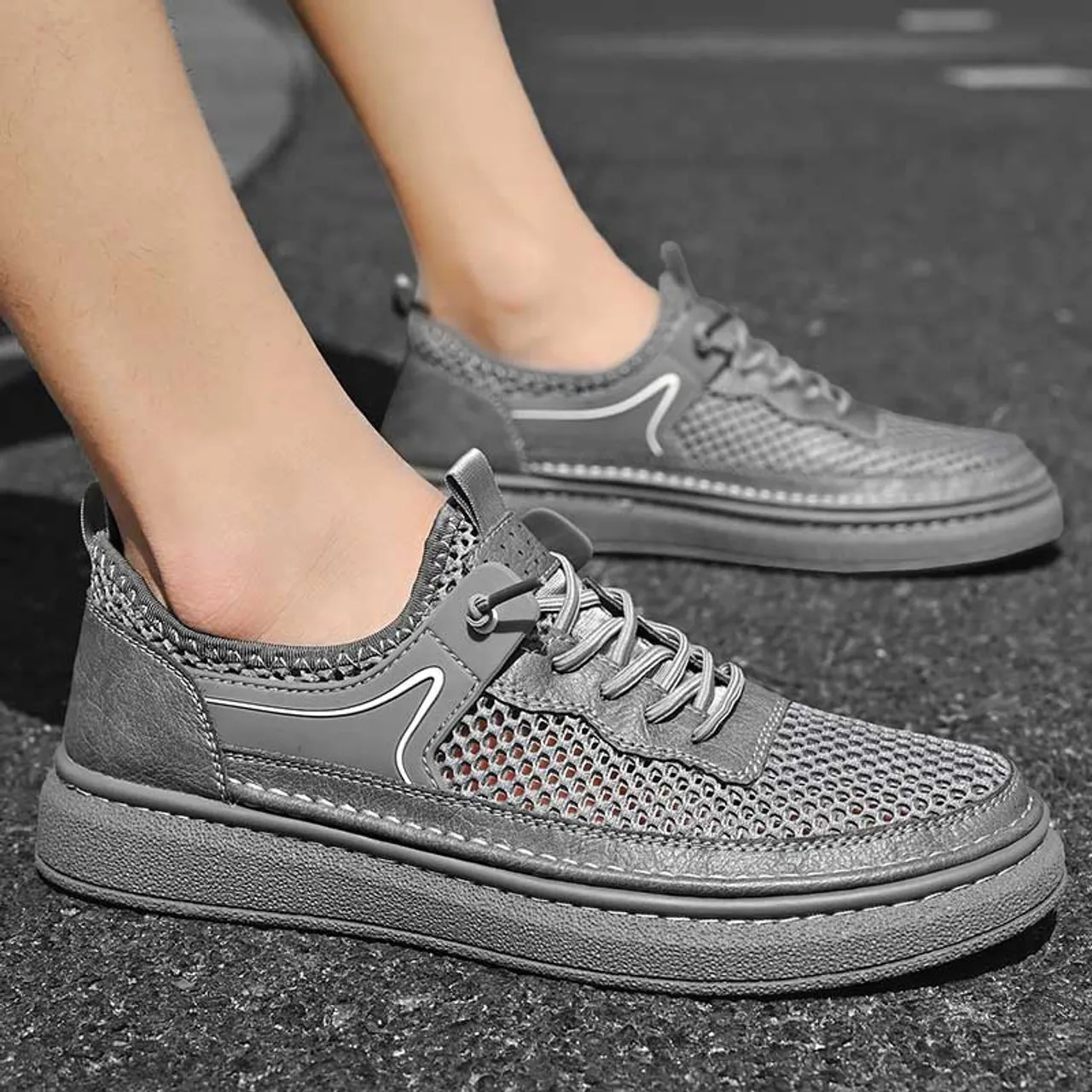 Grey hollow mesh stitch accents shoe sneaker